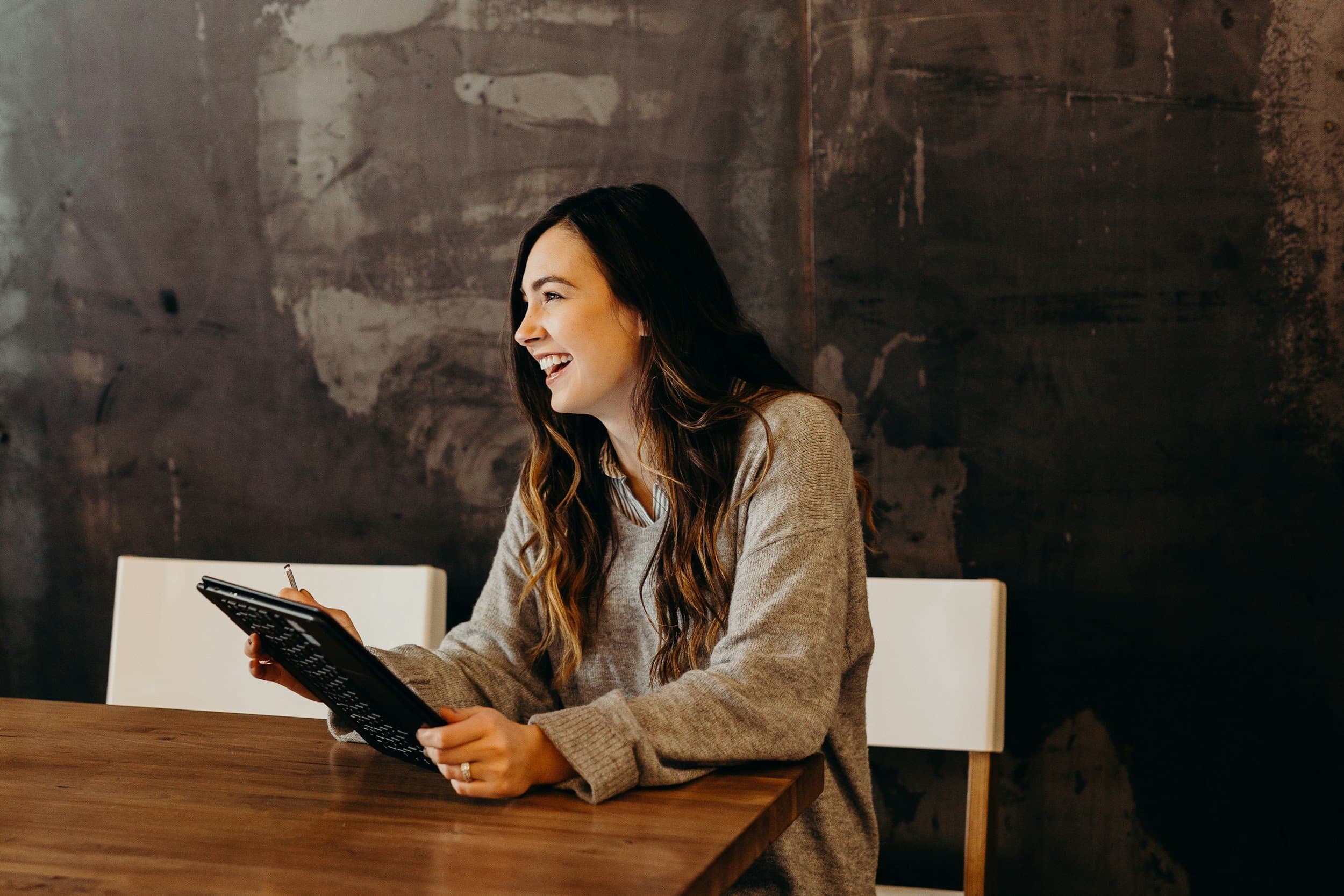 Professional reviewing AI readiness results on tablet